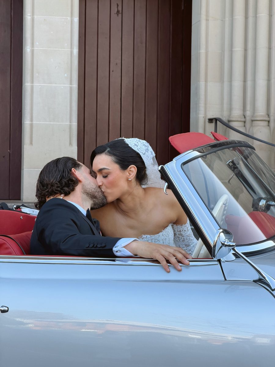 A kiss in the convertible