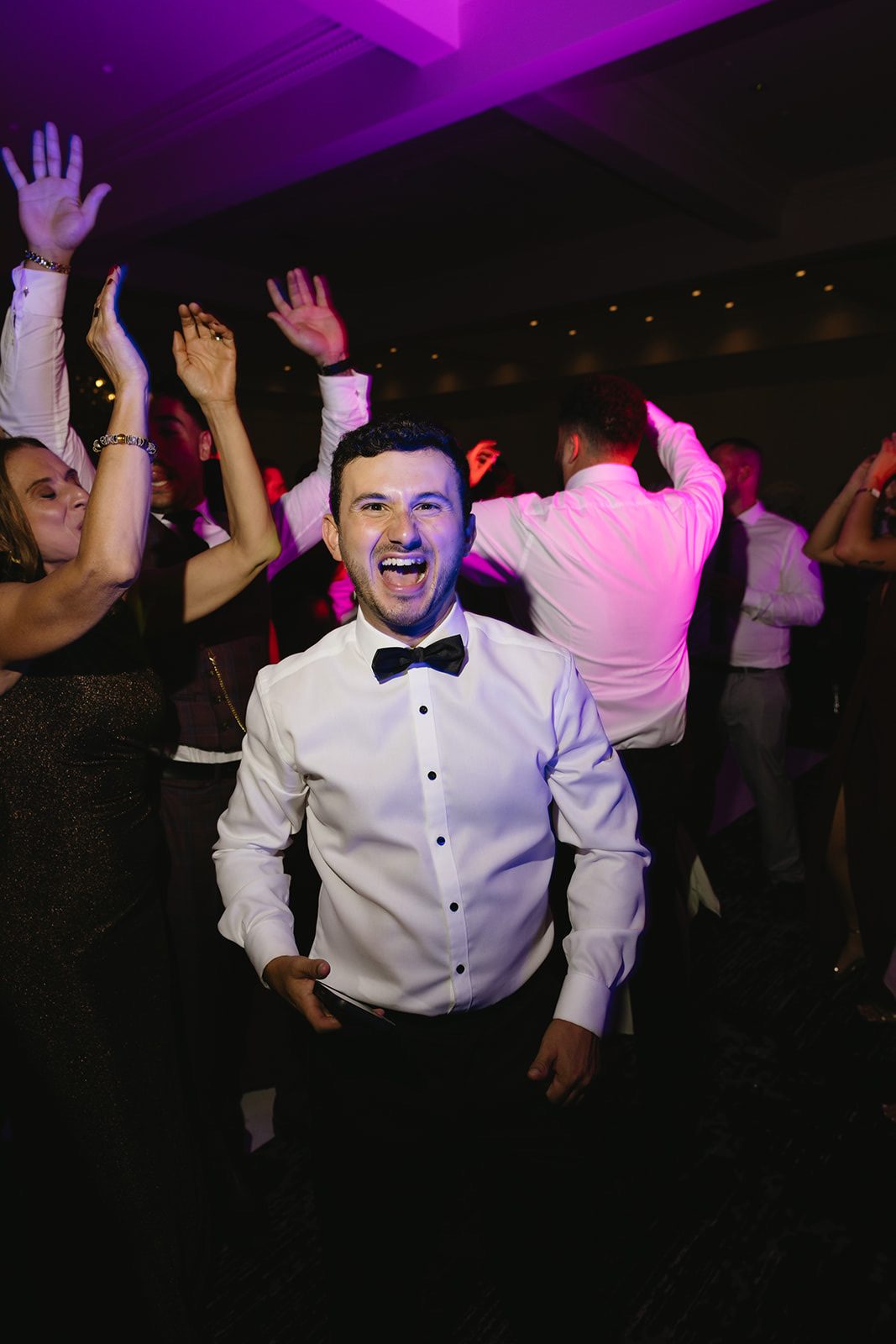 Frank on the dance floor with guests