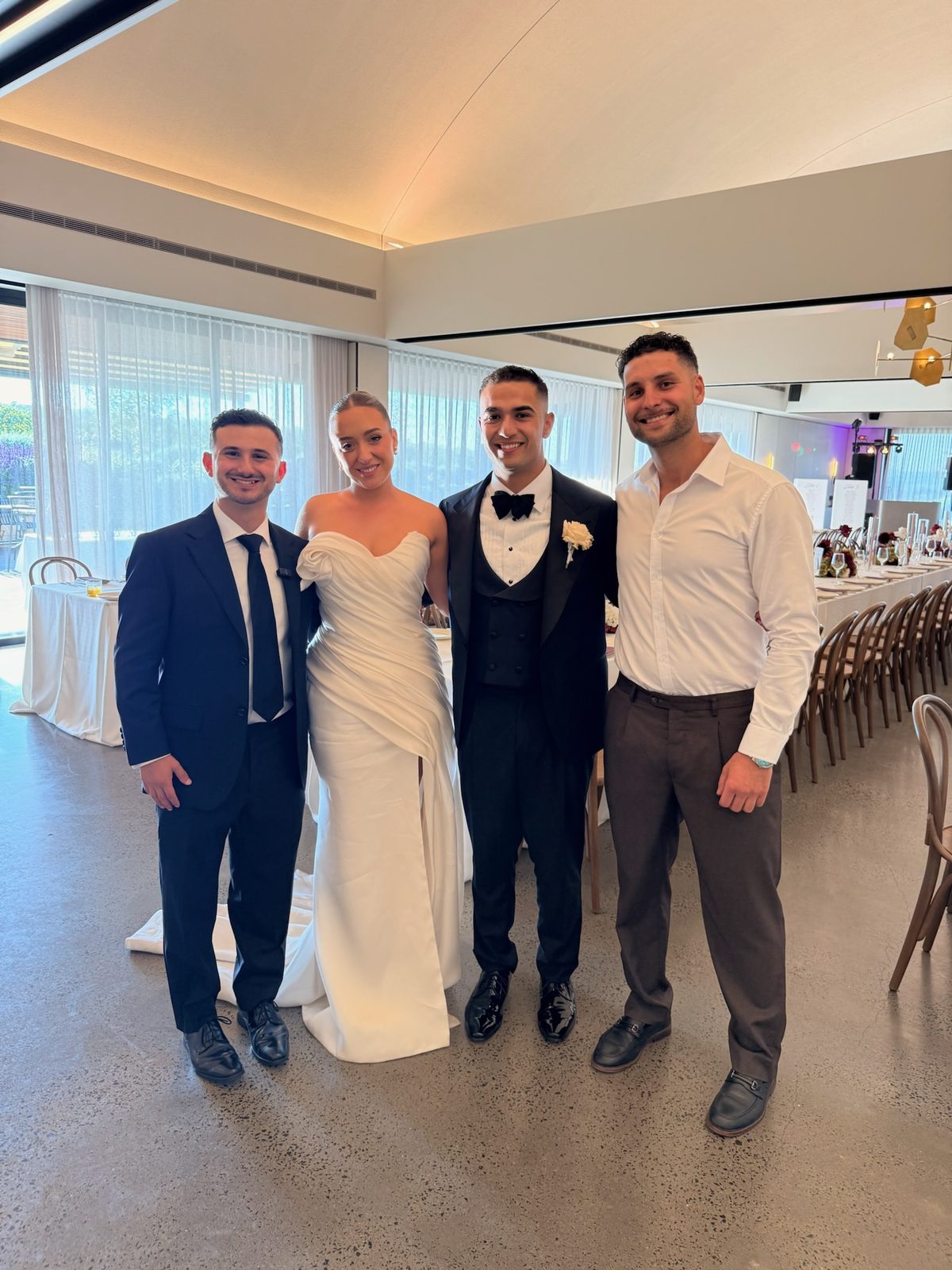 Frank and Adrian with the bride and groom