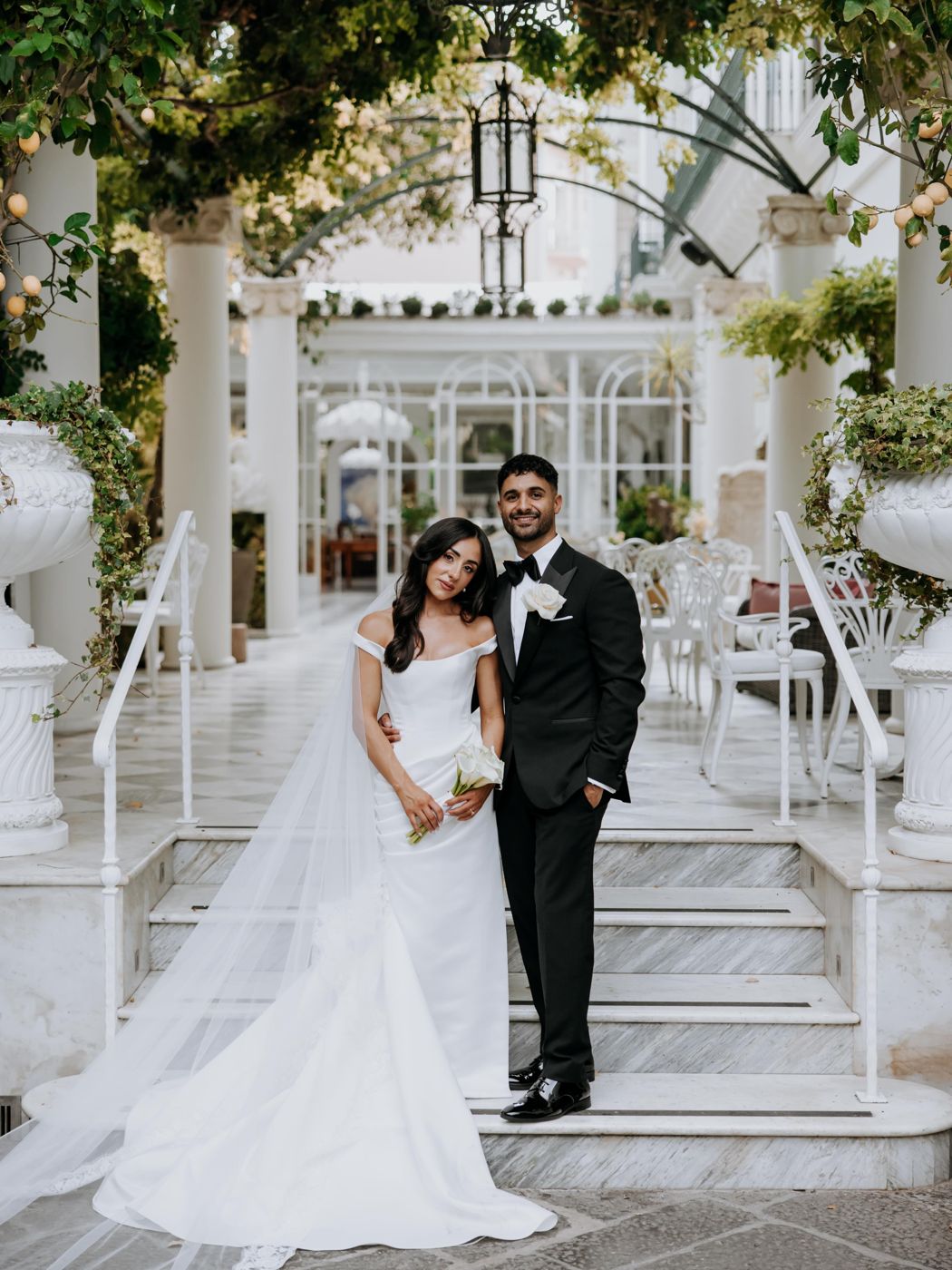 Newlyweds on the garden stairs of a villa in Sorrento
